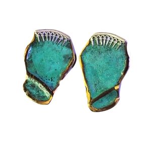 Artistic metal clip on earrings